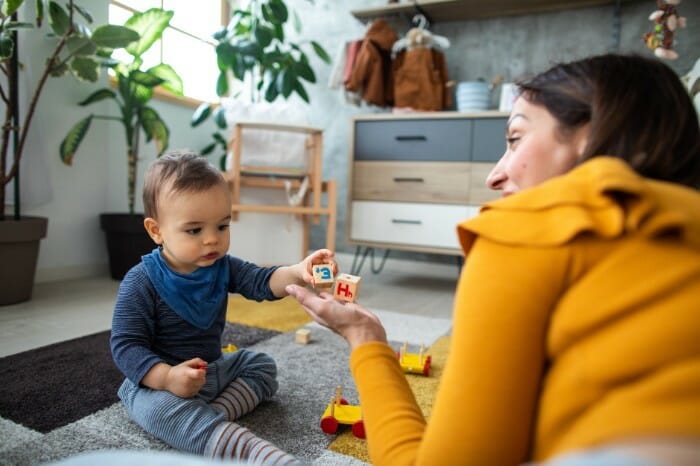 Baby playing with building blocks