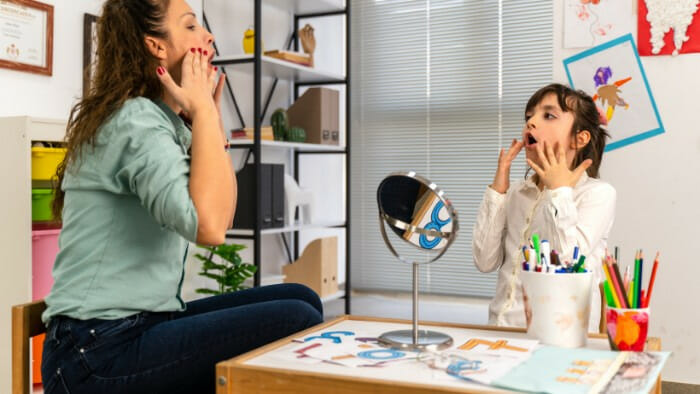 Speech Therapist with child