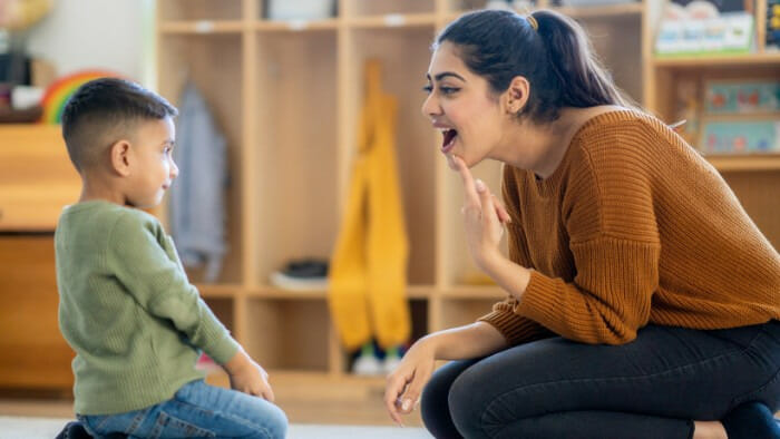 Speech Therapist and child